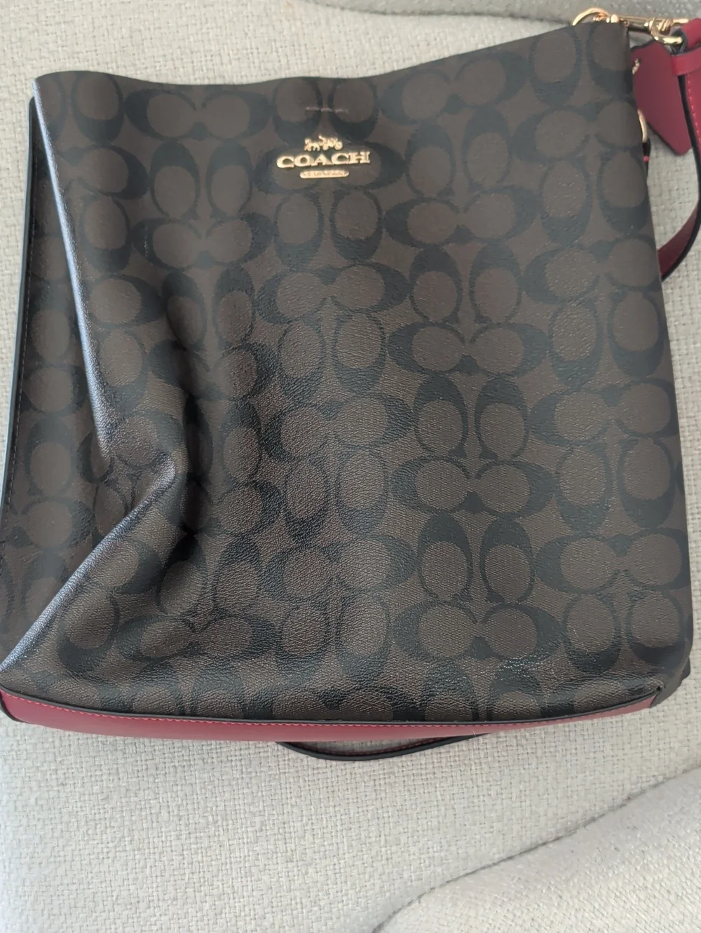 Coach Brown Signature Shoulder Bag with Red Strap